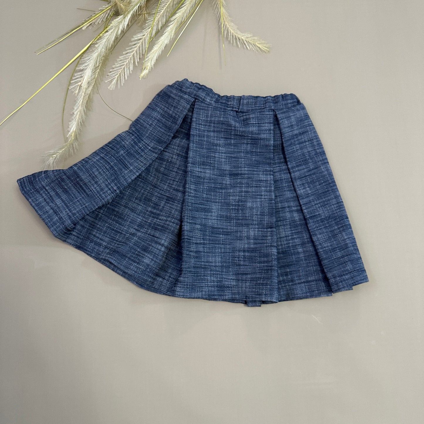 Gonna con piegone denim navy