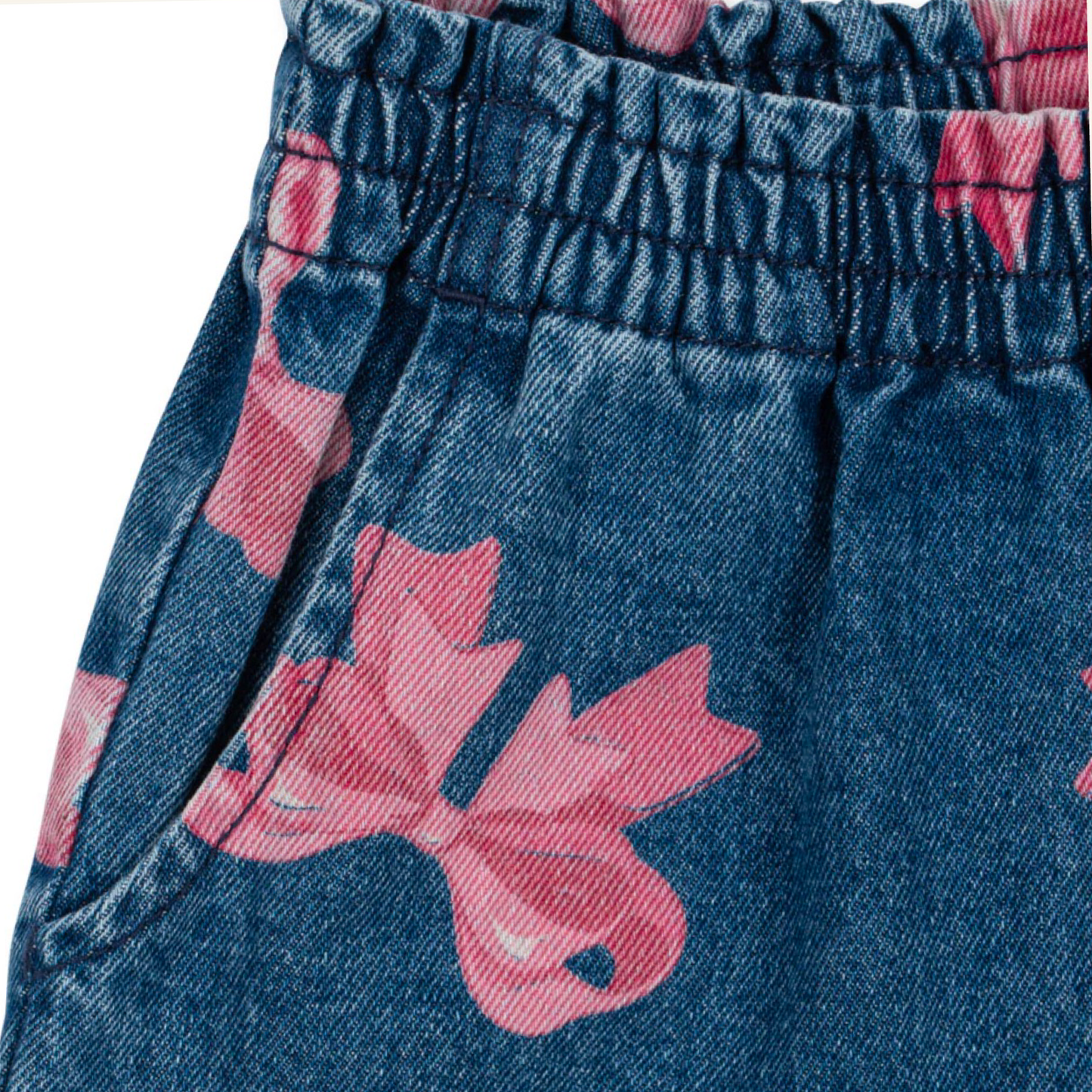 jeans in cotone organico con fiocchi rosa