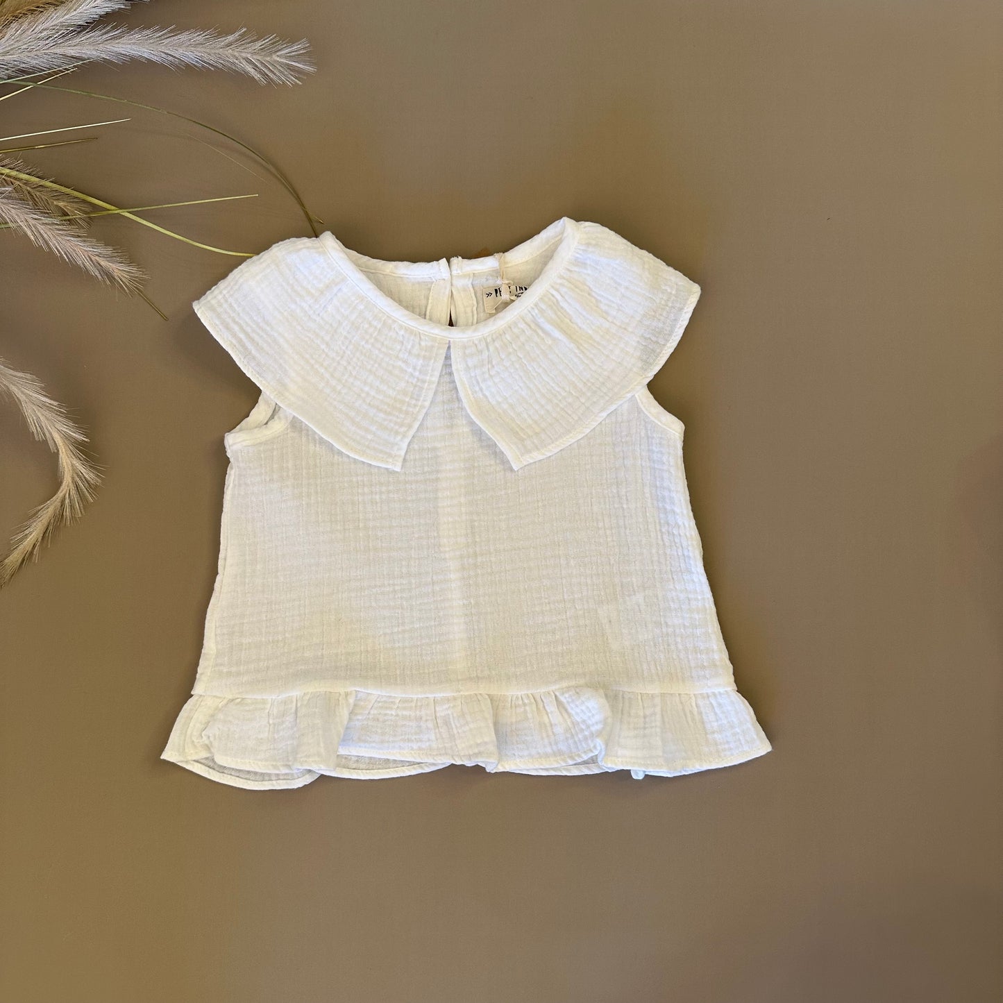 Blusa in mussola di cotone latte