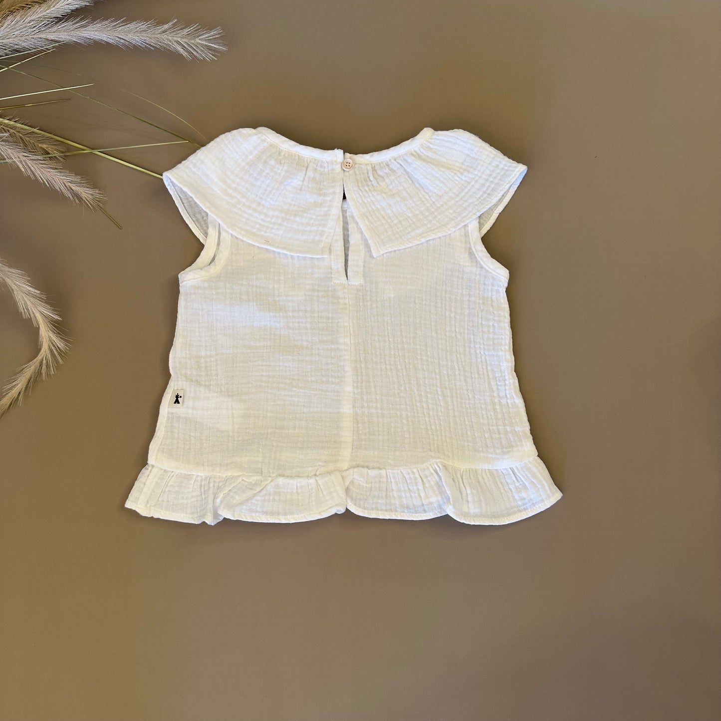 Blusa in mussola di cotone latte